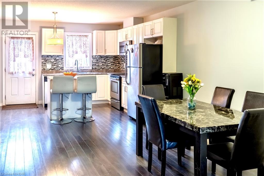 6117 Kelsey Crescent Unit# 8, Niagara Falls, Ontario  L2H 0B2 - Photo 4 - 40510720
