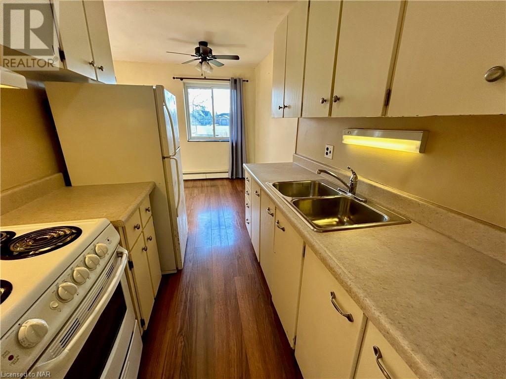 456 Carlton Street Unit# 6, St. Catharines, Ontario  L2M 4X1 - Photo 21 - 40521386